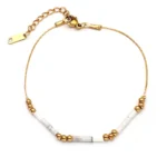Βραχιόλι από επιχρυσωμένο ατσάλι και ορυκτές πέτρες white howlite