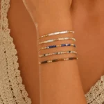Βραχιόλι από επιχρυσωμένο ατσάλι και ορυκτές πέτρες white howlite - Image 2