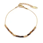 Βραχιόλι από επιχρυσωμένο ατσάλι και ορυκτές πέτρες tiger eye