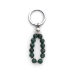 Μπρελόκ από πέτρες African Tirquoise διακοσμημένο με Νεκροκεφαλή από αναξείδωτο ατσάλι