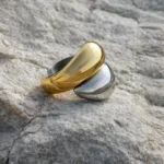 Γυναικείο δαχτυλίδι σε χρυσό-ασημί χρώμα και orb σχήμα - Image 2